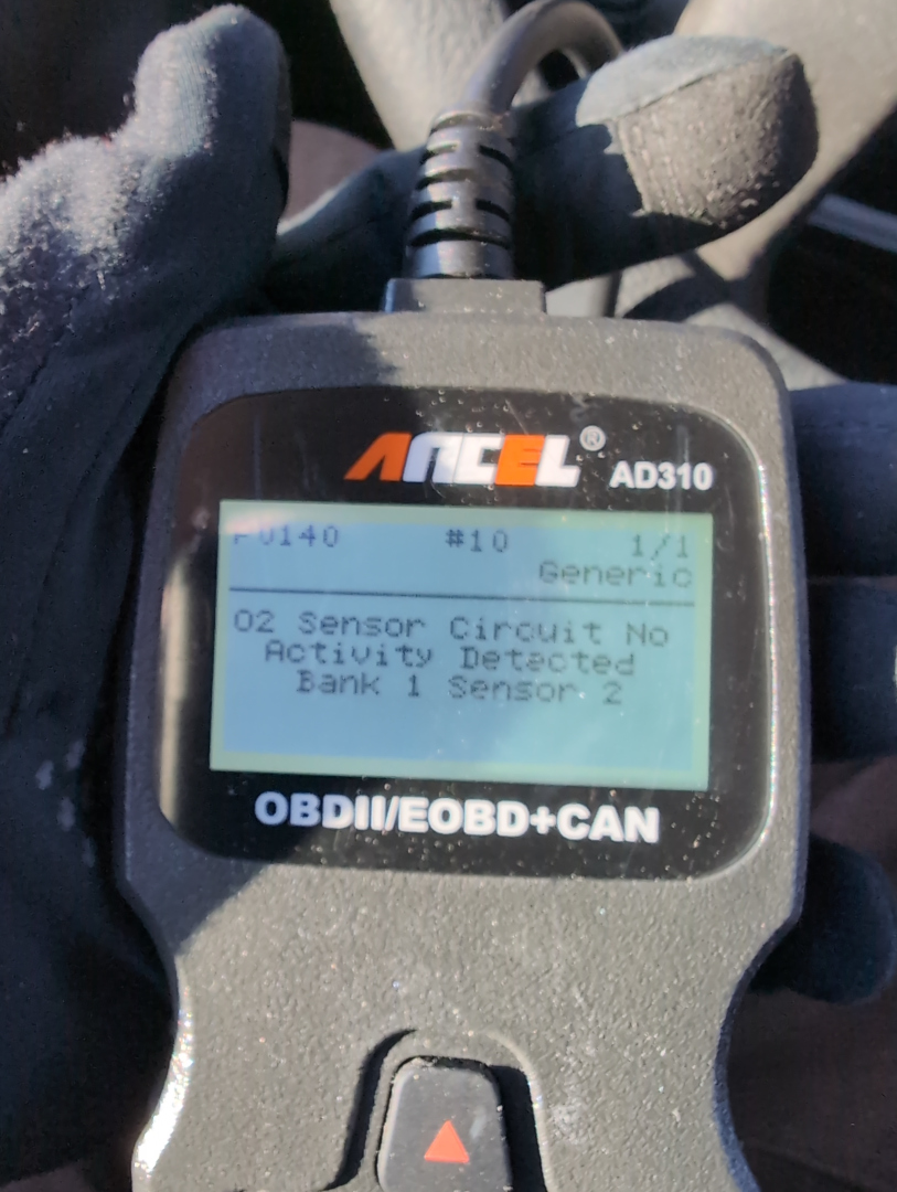 OBD-II reader showing code